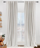 100% Blackout Shield front view beige curtains showing full coverage and privacy benefit