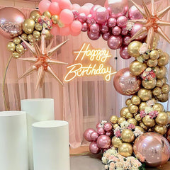 Adnkwolivt sign on a decorated backdrop creating a photogenic party focal point