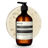 Aesop Reverence front dispenser showing minimalist packaging and clear product identity