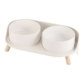 AHX front view elevated bowl set showing clean white ceramic and stand benefit tidy meals