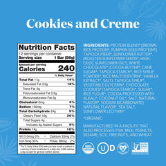 ALOHA single protein bar unwrapped with visible coating and cookie pieces, enticing snack option