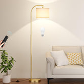 Ambimall front view of gold arc lamp showing full silhouette and warm ambience