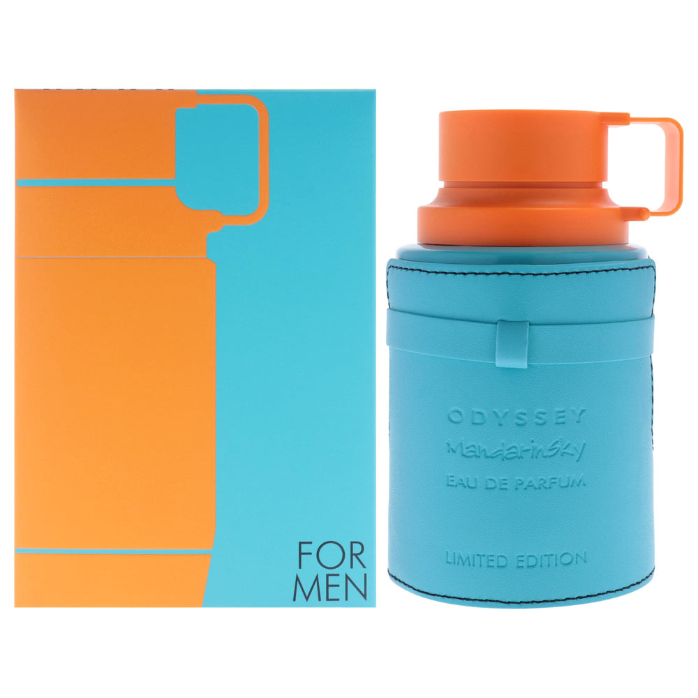 Armaf bottle front view showing bright mandarin packaging and confident presence