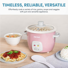 AROMA included measuring cup and serving spatula displayed to show portioning and serving convenience