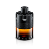 Azzaro bottle front view showing bold barrel design and amber juice benefit