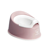 BabyBjörn front view of powder pink and white potty showing compact stability and appeal