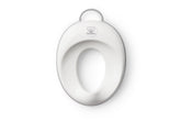 BabyBjörn toilet trainer front view showing white and gray ergonomic seat for comfort