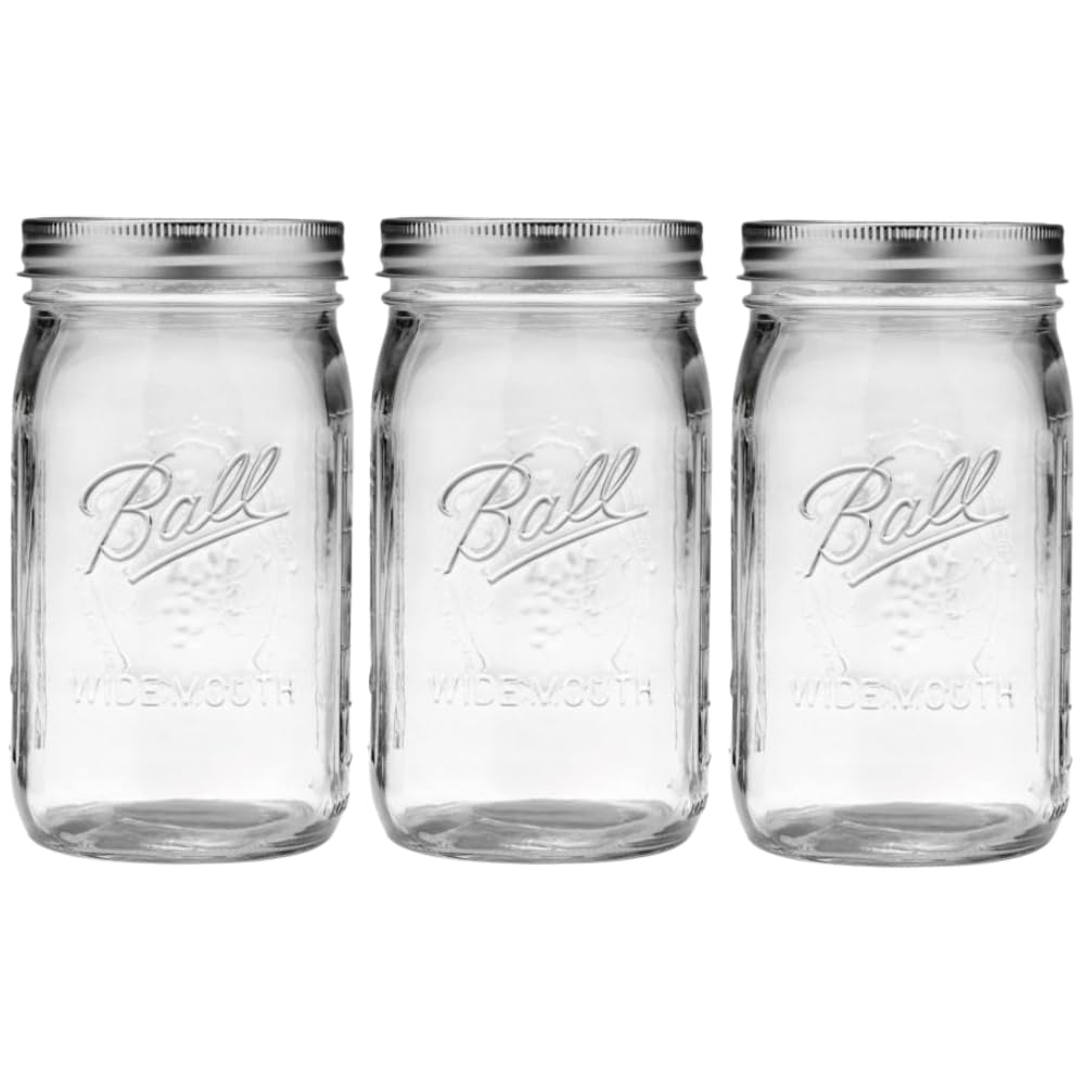 Ball front view of three 32 oz wide-mouth jars showing clear glass and labels for easy storage