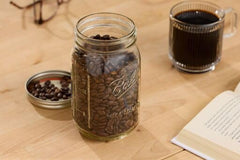 Ball open jar filled with homemade jam showing wide mouth for easy filling and spooning