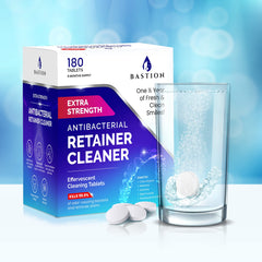 Bastion tablet dissolving in glass demonstrating fast effervescent cleaning