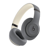 Beats Studio Pro front view shows sleek Sand Gray design and premium finish