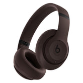 Beats Studio Pro front view showing sleek deep brown finish and ergonomic shape benefit comfort