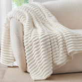 BEDELITE cream throw front view showing soft ribbed design and decorative benefit