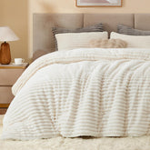 BEDELITE front view showing cream white comforter on bed for inviting warmth