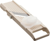 Benriner front view showing beige mandoline and blades for faster prep