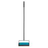 Bissell Easy Sweep Compact front view showing teal body and handle, highlighting quick cleanup