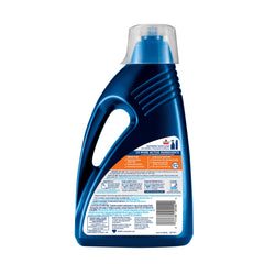 Bissell bottle pouring solution into a cleaner tank for easy filling