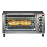 BLACK+DECKER front view showing compact stainless steel oven and controls for versatile cooking
