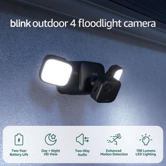 Blink Outdoor 4 mounted at night with 700 lumens illuminating driveway