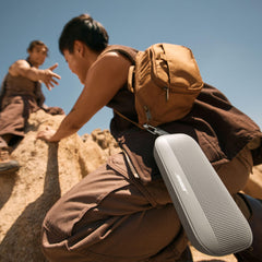 Bose SoundLink Flex top buttons closeup, quick playback control and call handling