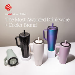 BrüMate Era placed in a car cup holder illustrating travel-friendly fit