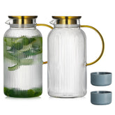 Buaic front view of two glass pitchers showing vertical stripes and clear capacity for elegant serving
