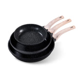CAROTE frying pan set front view showing three nonstick skillets and handles for versatile cooking