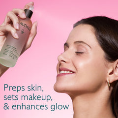 Caudalie Beauty Elixir misting spray in motion for instant radiance boost