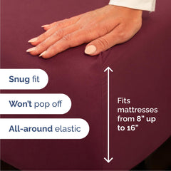 CGK Unlimited two burgundy pillowcases laid flat highlighting smooth finish and comfort