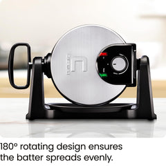 Chefman waffle maker in mid-180° flip demonstrating even batter distribution for uniform waffles