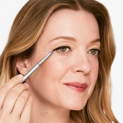 Clinique Quickliner texture swatch on skin showing smooth pigment payoff benefit