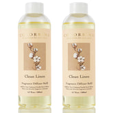 COCORRÍNA front view of two refill bottles showing clean linen scent benefit