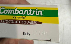 Combantrin chocolate square close-up showing texture and glossy finish with appetizing detail