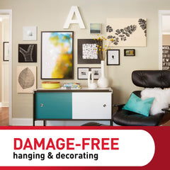 Command strips attached to frame and wall illustrating tool-free hanging and stable display