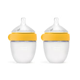 Comotomo front packaging showing two yellow 5oz bottles and benefits