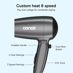 Conair held in hand to show size and lightweight comfort during use