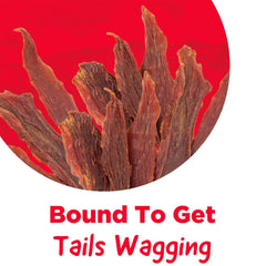 Country Kitchen hand holding treat showing duck jerky size and portion control
