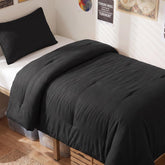 CozyLux comforter front view showing neat black finish and smooth drape for a tidy bed