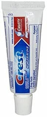Crest tube inside a toiletry bag showing portable size and on-the-go protection