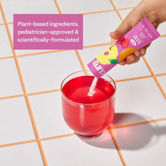 Glass of mixed Cure Hydration fruit punch demonstrating refreshing hydration