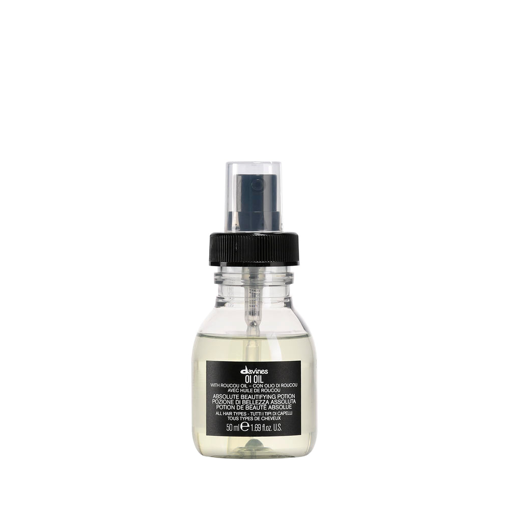 Davines OI Oil travel front bottle shows compact convenience and shine benefit