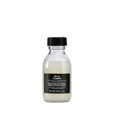 Davines travel shampoo front packaging showing compact convenience and brand