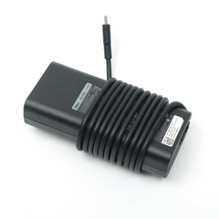Dell adapter top label close-up showing model HA65NM190 and safety info
