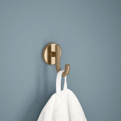 Delta close-up of champagne bronze finish highlighting brushed texture and durability