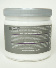Design Essentials conditioner on hand ready to apply for detangling benefit