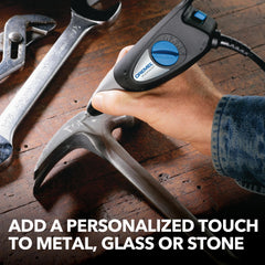 Hand holding Dremel soft-grip showing comfortable control during use