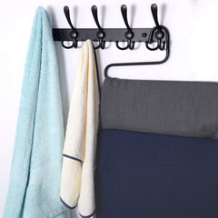 Dseap mounted in entryway holding coats and backpacks neatly