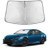 EcoNour sunshade front view on Camry showing full windshield coverage and heat reduction