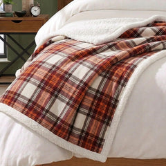 Eddie Bauer throw draped on sofa illustrating comfort during movie nights