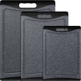 Empune front view of three dark grey cutting boards showing set and packaging for quick selection
